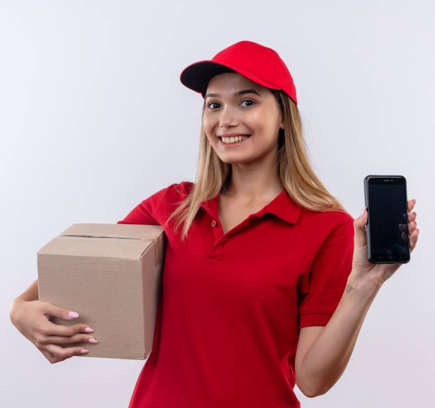 https://www.newcablojistik.com/wp-content/uploads/2023/07/smiling-young-delivery-girl-wearing-red-uniform-cap-holding-box-phone-isolated-white.jpg